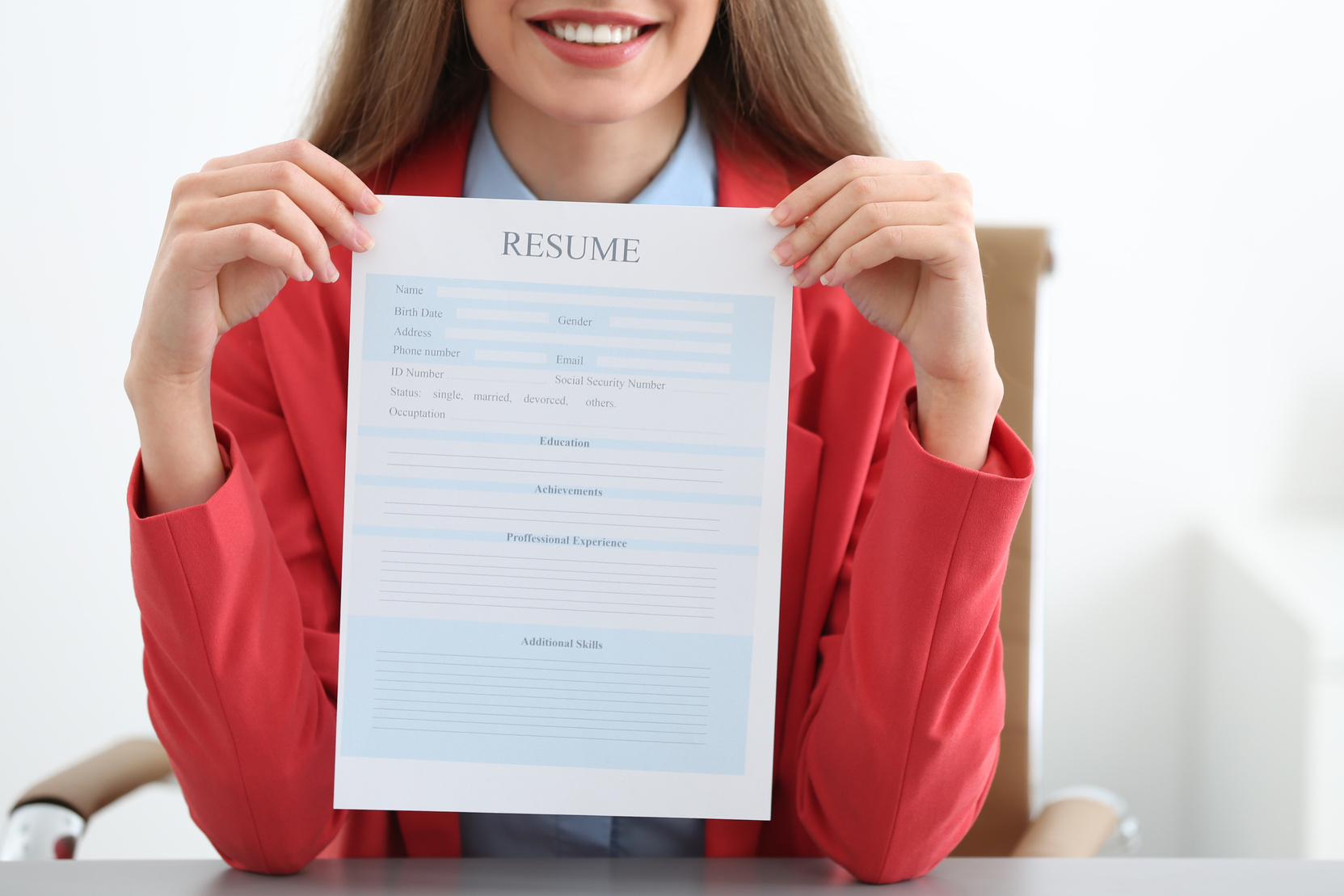 Woman Holding Resume 